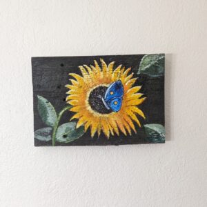 Barn wood painting of a sunflower